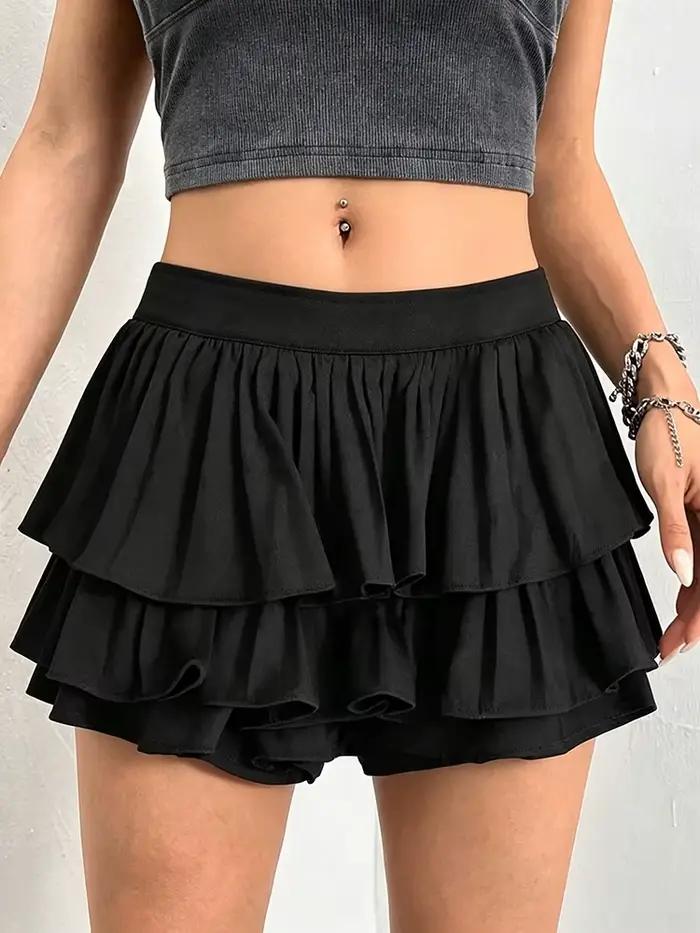 Jupe mini plissée noire style grunge avec short intégré à double ceinture