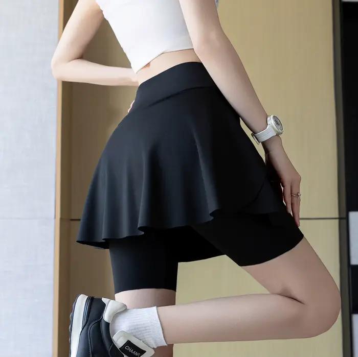 Jupe courte athlétique pour femme qui couvre les hanches et vous fait paraître plus mince