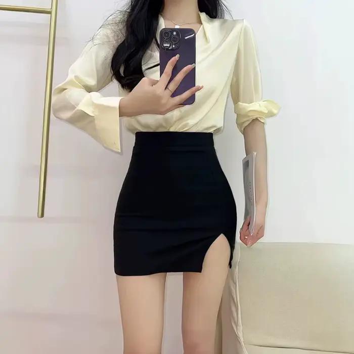 Mini-jupe noire élastique sexy pour femme
