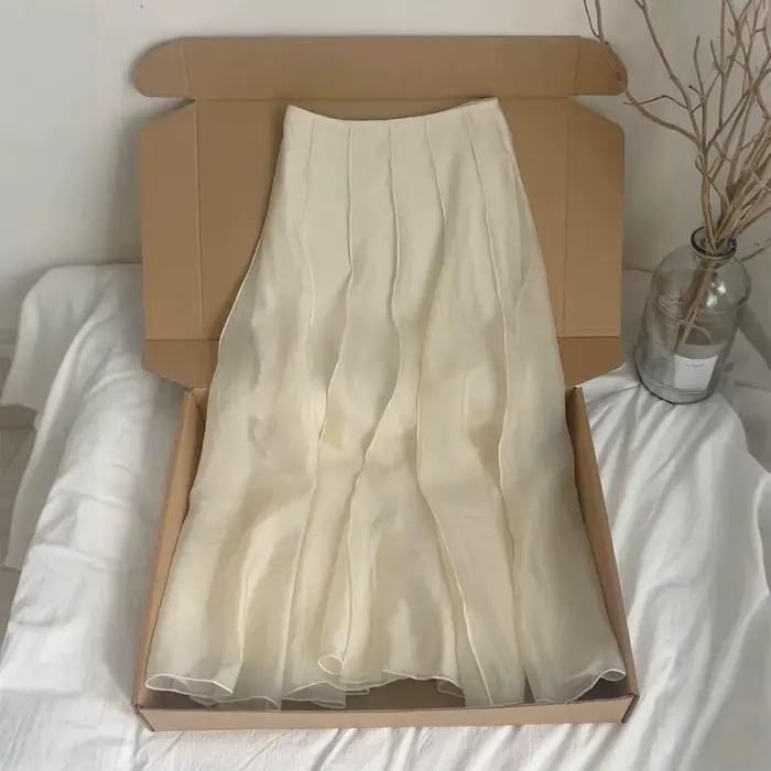 Recommandation de niveau Chao! Jupe mi-longue plissée trapèze abricot avec bordure en dentelle taille haute amincissante Nouveau style 2026