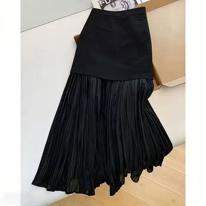 Jupe plissée noire à empiècements pour femme