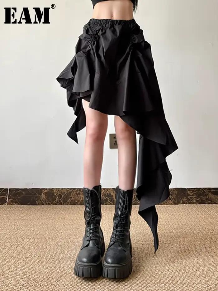 [EAM] taille haute élastique noir conception irrégulière volants Mini demi-corps jupe femmes mode marée nouveau printemps automne 2026 1DJ0530