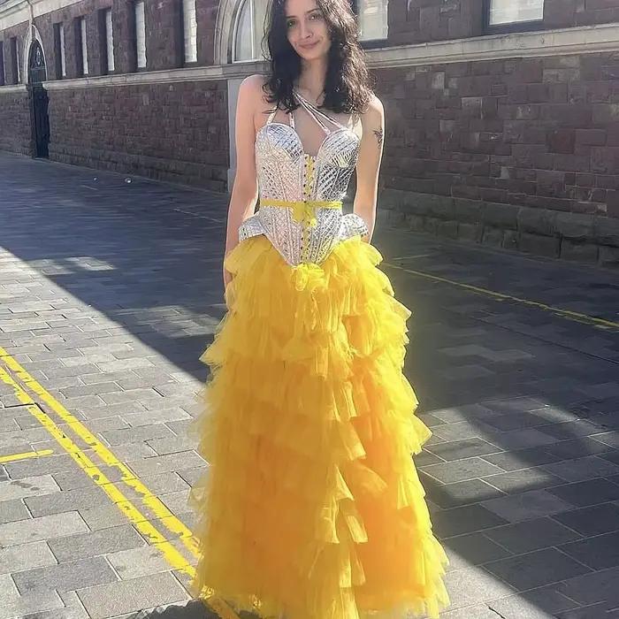 Jupe longue jaune à volants pour femme