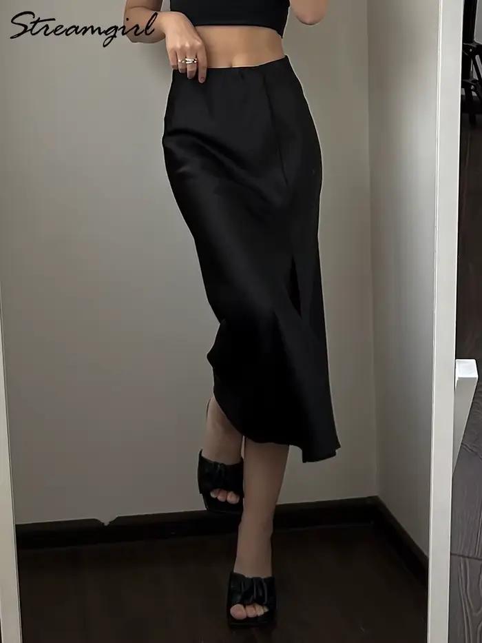 Jupe mi-longue en satin noir pour femme