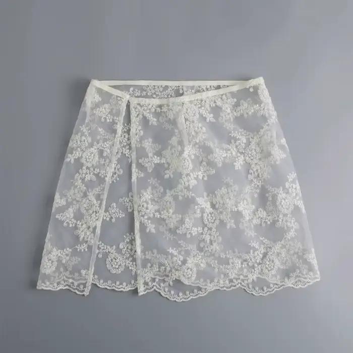 E56A Femmes coréennes à broderie fleur en dentelle courte jupe tablier