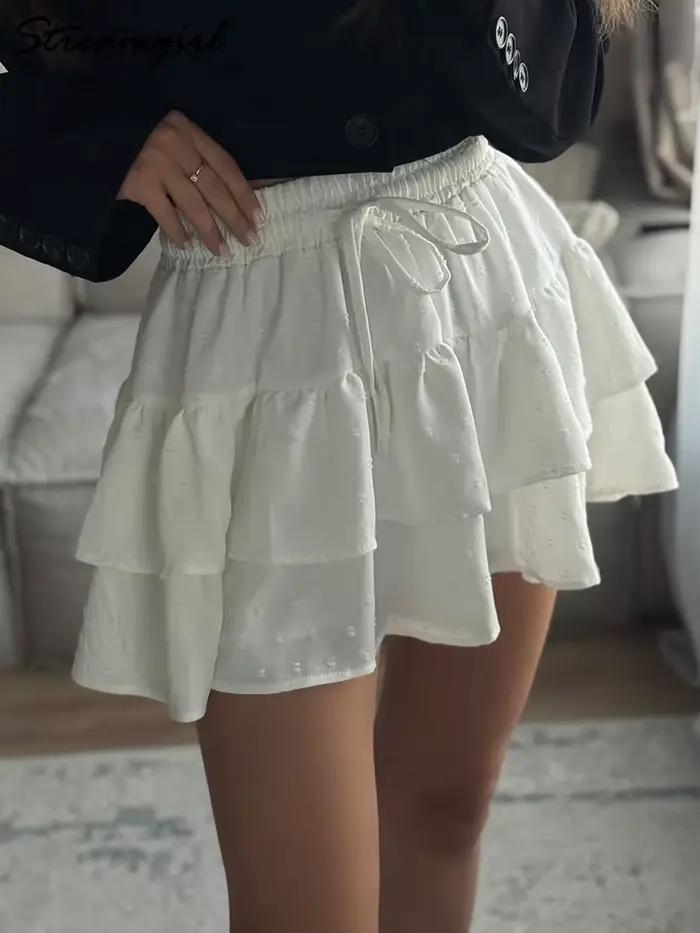 Streamgirl femmes Mini jupes avec Short sous les vêtements d'été cravate une ligne courte blanche plissée à volants