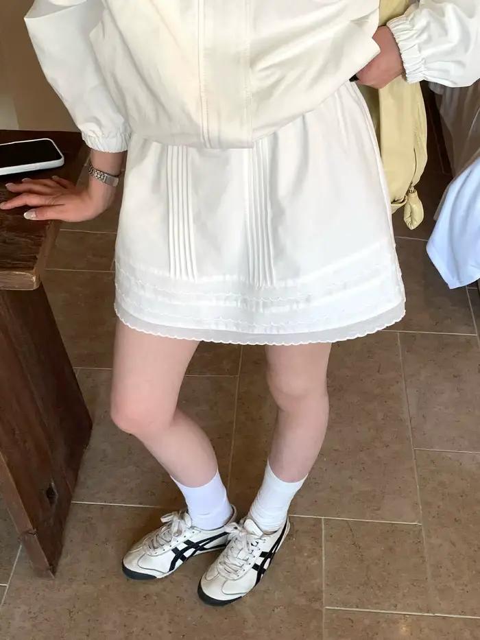 Jupe courte plissée en dentelle à taille élastique pour filles et femmes
