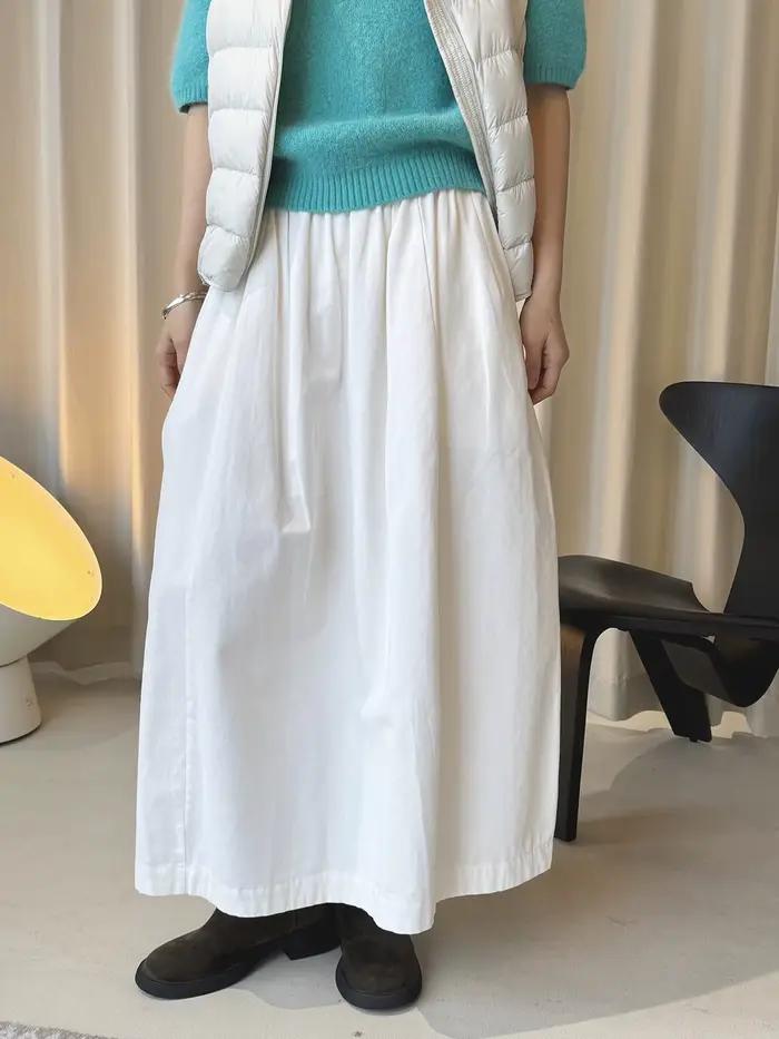 Début du printemps simple taille haute bouton élastique demi-jupe ample minceur décontracté jupe longue pour les femmes