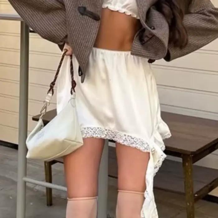Sexy dentelle blanc asymétrique jupes mi-longues rue Chic Satin taille haute jupe mince été décontracté solide