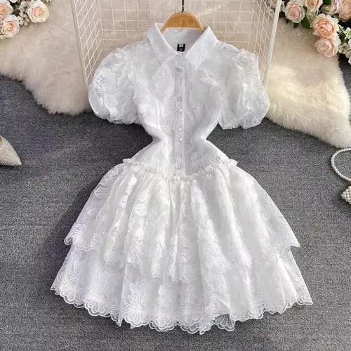 Robe d'été en dentelle blanche pour femmes, tunique de tempérament, manches bouffantes, broderie, à