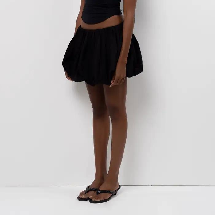 Femmes lanterne Mini jupes été décontracté coupe ample taille élastique couleur unie courte jupe bou