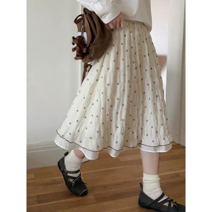 Jupe à pois plissée texture contrastante avec bordure contrastante, coupe trapèze, nouvelle collecti