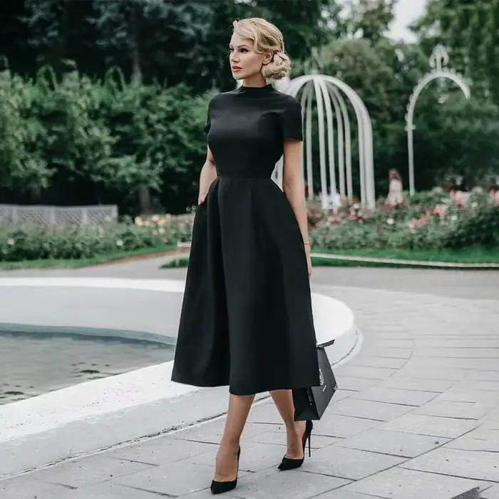 Robe mi-longue noire élégante pour femme, col mi-haut, taille haute, robes trapèze, coupe couvertes,