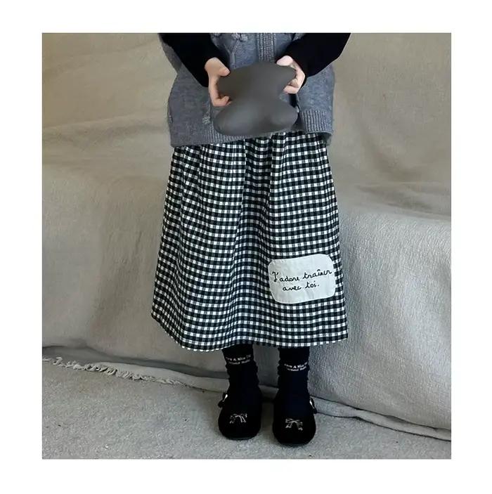 Jupe en latex de la série coréenne pour filles, vêtements pour enfants, polyvalent, longueur moyenne