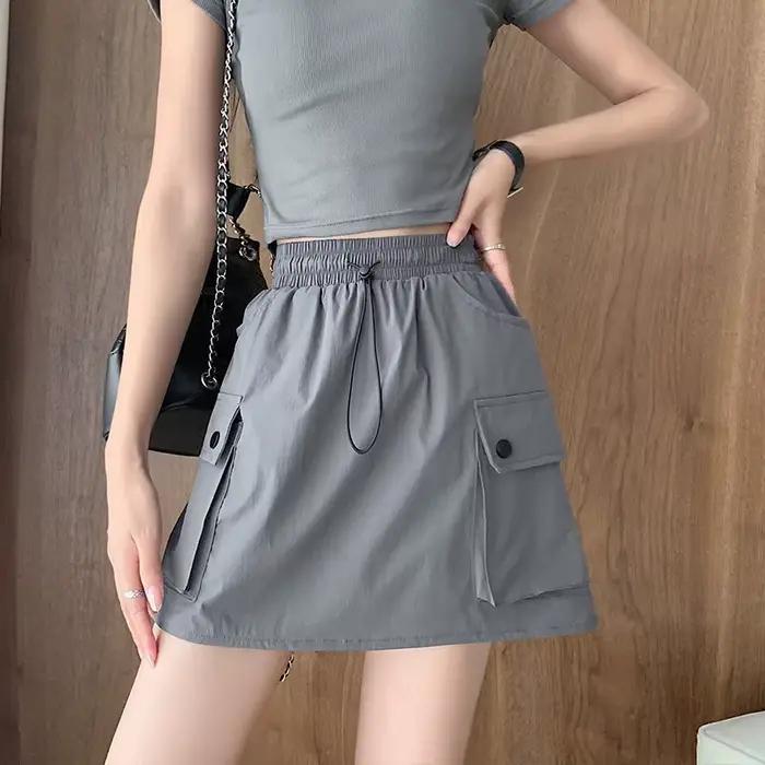 Jupe de travail pour femme à taille élastique et cordon de serrage, nouveau style d'été, mini-jupe t