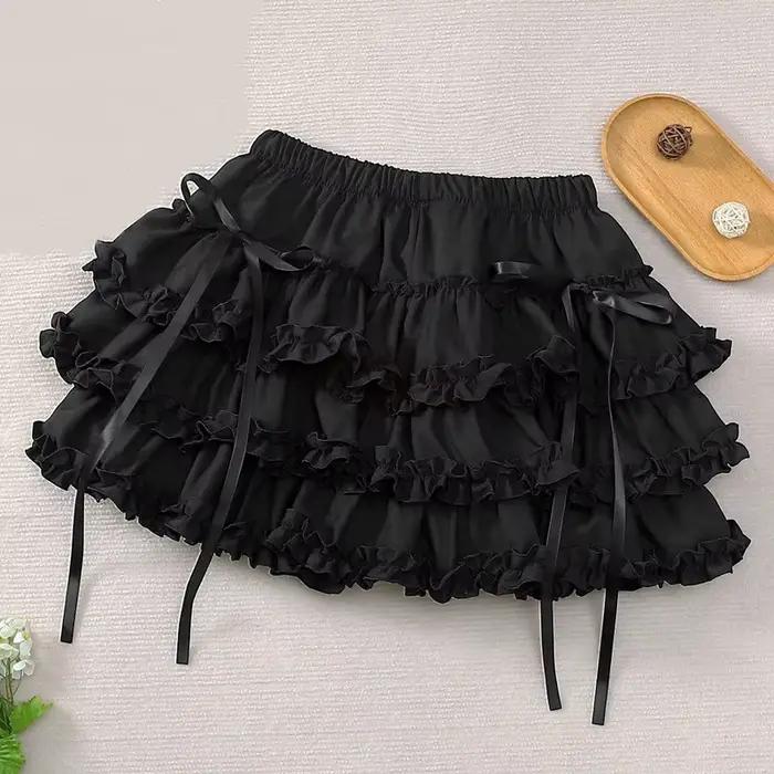 Femmes jupe courte noire Style Preppy japonais jupe femme taille élastique Tutu jupes dentelle volan