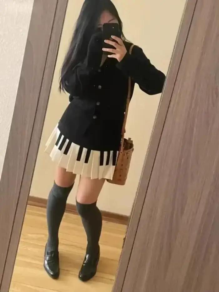 Jupe plissée vintage piano noir et blanc de style doux et épicé pour femmes