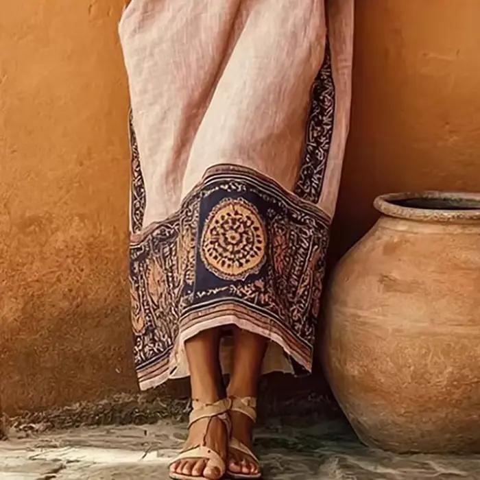 Robe longue ethnique sexy à épaules dénudées et découpes pour femme, imprimé géométrique, poches, coupe ample, maxi-robe décontractée pour le printemps et l'été, idéale pour les vacances