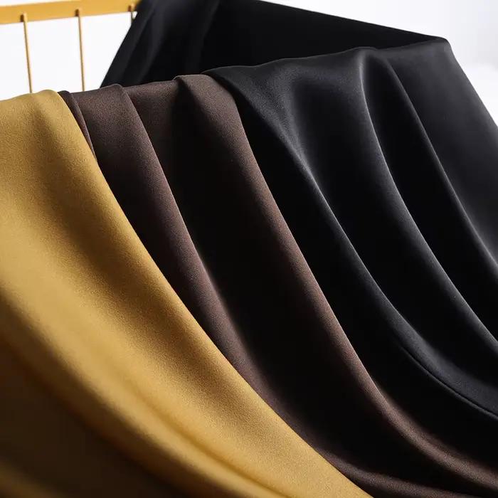 Jupe longue enveloppée de hanche en satin pour femme