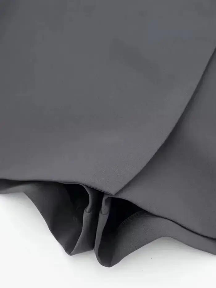 Jupes courtes asymétriques avec languette pour femmes