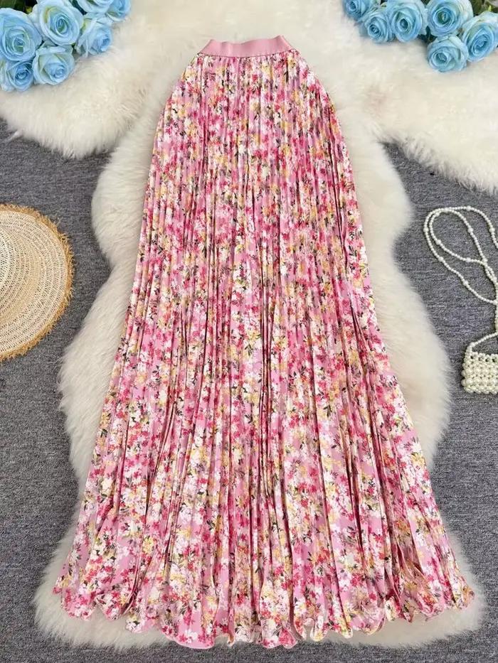 Nouvelle jupe plissée à imprimé floral pour femme, style vacances d'été 2026, élégante et polyvalente, jupe longue