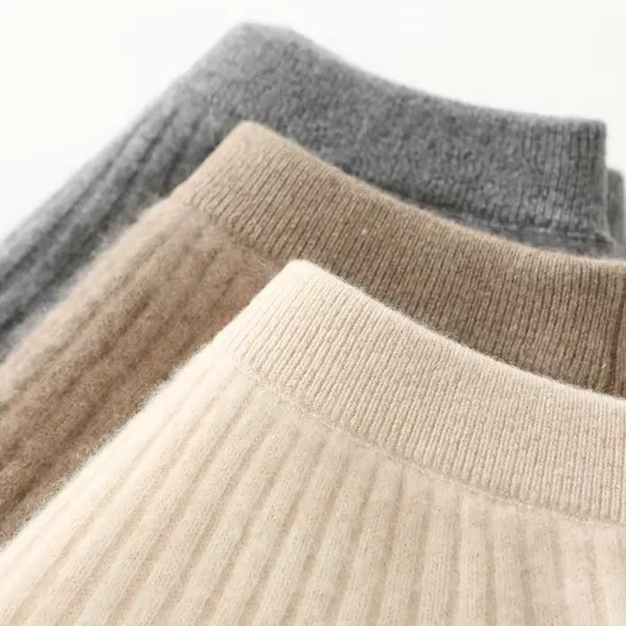 Jupe mini coréenne en laine mérinos pour femme, couleur unie, mode automne hiver, tour de taille empire, tricotée, légèrement extensible, style bureau dame, disponible en plusieurs tailles et couleurs