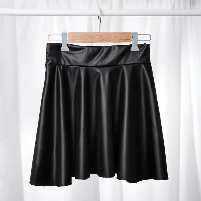 Mode chaude patineuse polyvalente élastique Faux cuir jupes jupe courte Mini taille haute