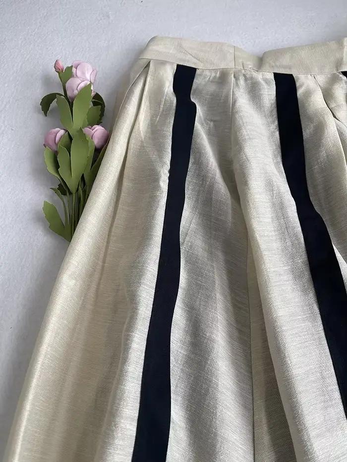Jupe mi-longue plissée en lin mixte style français élégant à offrir pour femme printemps été occasions spéciales