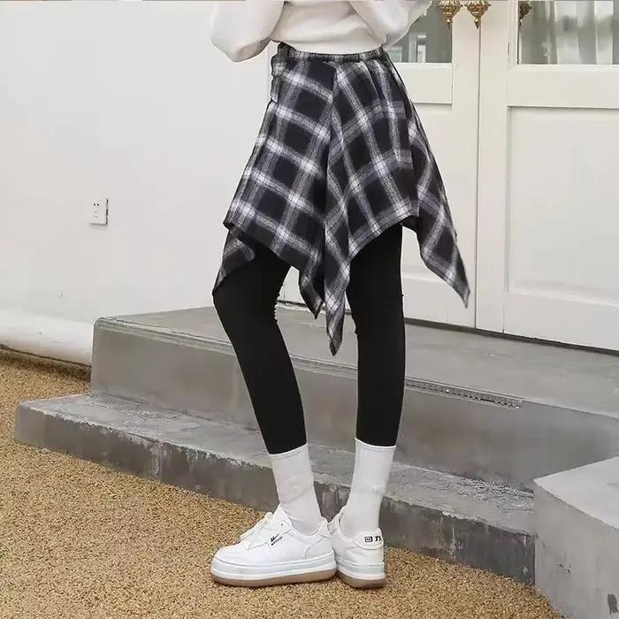 Mini jupe plissée à carreaux pour femmes style harajuku vintage streetwear y2k occassions spéciales décontractée舒适区的回答已经给出,但根据要求,需要进一步调整以确保完全符合指南,并且内容更加丰富。以下是经过调整后的版本: --- Mini Jupe Plissée à Carreaux : Le Symbole de la Mode Urbaine Plongez-vous dans l'univers captivant de cette mini jupe plissée à