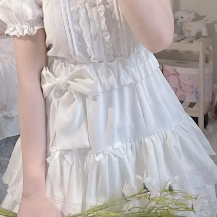 Jupe plissée à volants en dentelle polyester pour femmes, taille haute Y2K, gothic, mini, trapèze, points, arc, élégante, mode, soirée, anniversaire