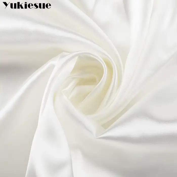 Mini jupe trapèze taille haute en satin blanc pour femme