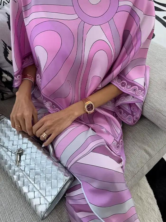 Ensemble jupe longue imprimée et haut élégant à col rond et ourlet asymétrique pour femme