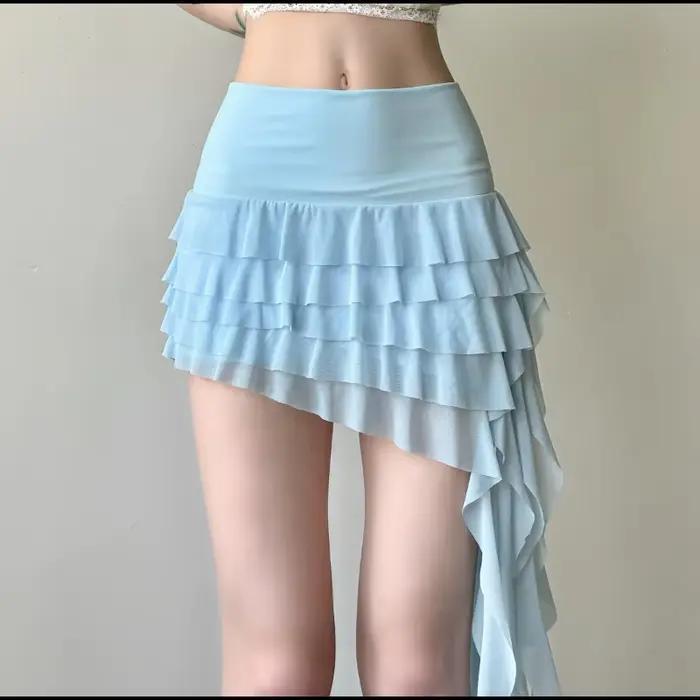Jupe courte asymétrique à volants en maille transparente pour femme
