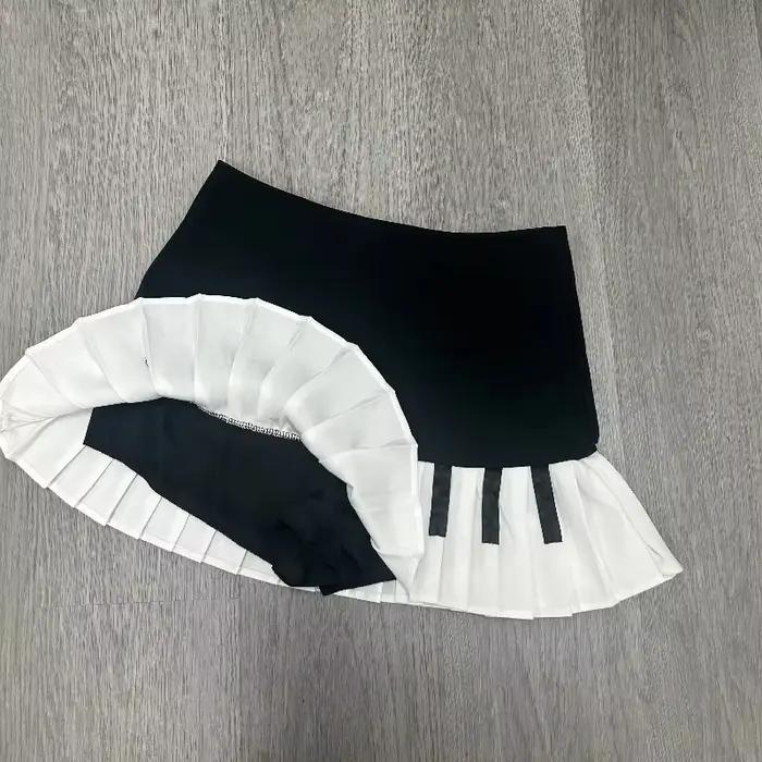 Jupe plissée vintage piano noir et blanc de style doux et épicé pour femmes