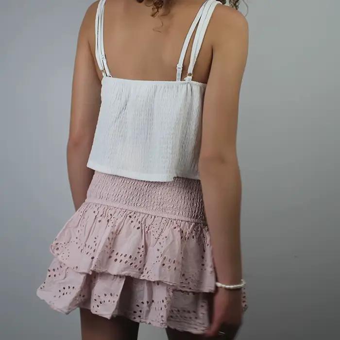 Mini jupe plissée à volants superposés à œillets jacquard pour femmes