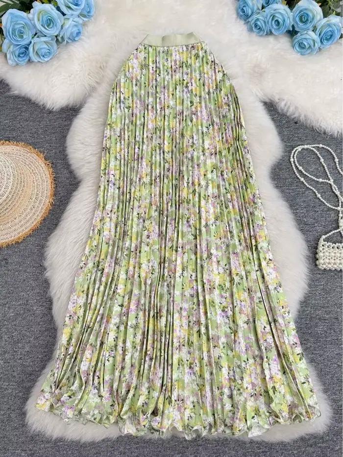 Nouvelle jupe plissée à imprimé floral pour femme, style vacances d'été 2026, élégante et polyvalente, jupe longue