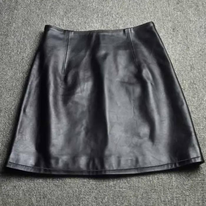 Cuir véritable 2025 une ligne coupe ajustée enveloppement fesses jupe courte en peau de mouton taille haute