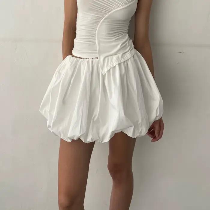 Femmes lanterne Mini jupes été décontracté coupe ample taille élastique couleur unie courte jupe bouffante Style doux