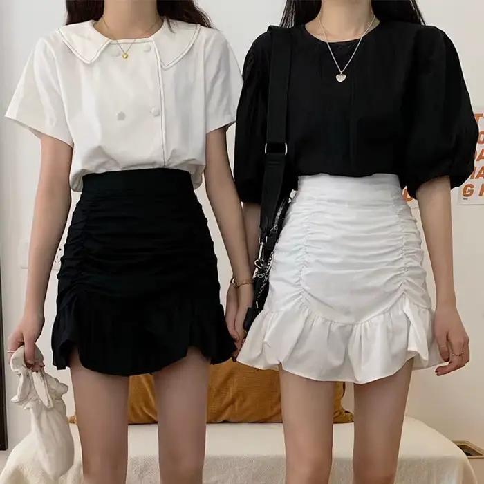 Jupe courte plissée taille haute polyvalente pour femme