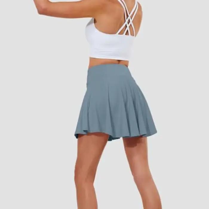 Jupes de tennis plissées avec shorts intégrés et poches