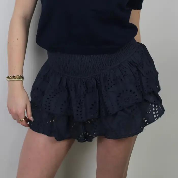 Mini jupe plissée à volants superposés à œillets jacquard pour femmes