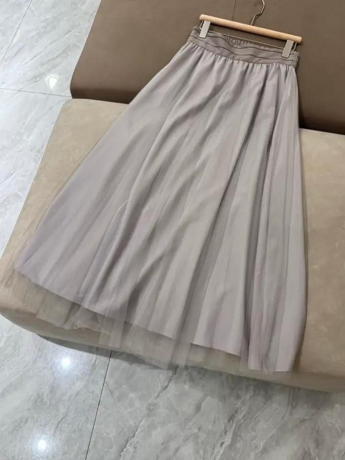Jupe mi-longue pour femme, polyvalente et élégante, à la mode