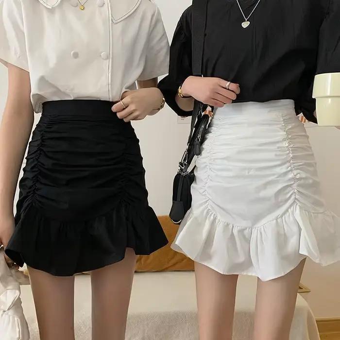 Jupe courte plissée taille haute polyvalente pour femme
