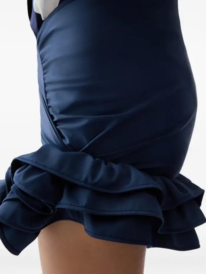 Jupe mini asymétrique à volants noués en satin bleu marine taille haute