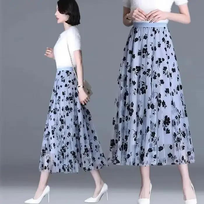 Jupe en gaze jupe demi-fée florale printemps et été nouvelle jupe trapèze plissée dans la longue jupe en gaze fine taille haute