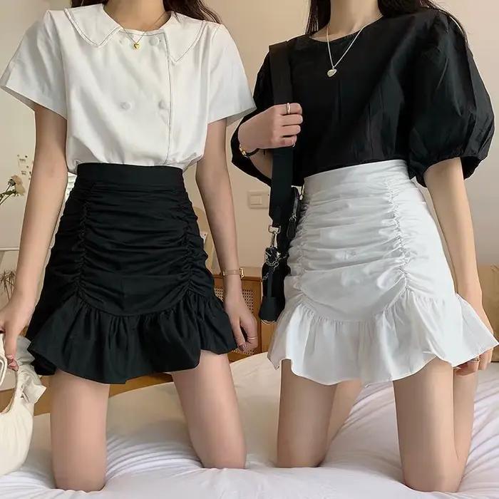 Jupe courte plissée taille haute polyvalente pour femme