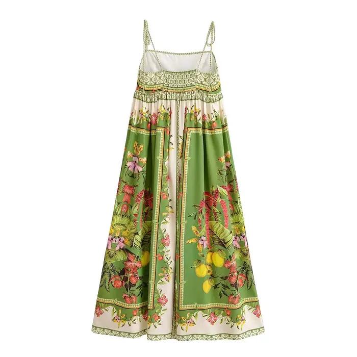 Robe longue mi-mollet bohème verte à imprimé floral contrastant avec nœud et laçage