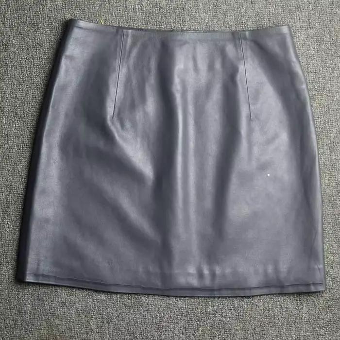 Cuir véritable 2025 une ligne coupe ajustée enveloppement fesses jupe courte en peau de mouton taille haute