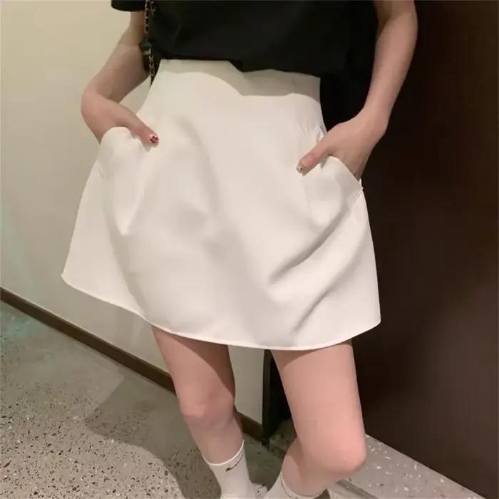 Style de travail coréen costume jupes été nouveau Design noir blanc taille haute