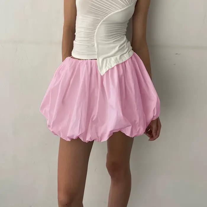 Femmes lanterne Mini jupes été décontracté coupe ample taille élastique couleur unie courte jupe bouffante Style doux